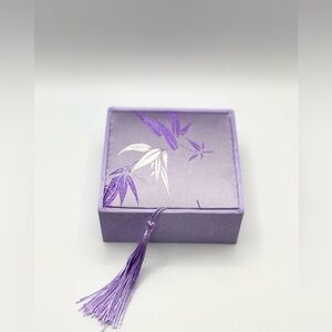 Elegant Purple Jewelry Box with Tassle